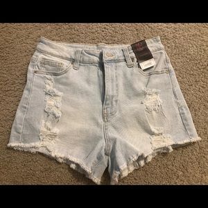 Women’s high waisted ripped jean shorts size 5